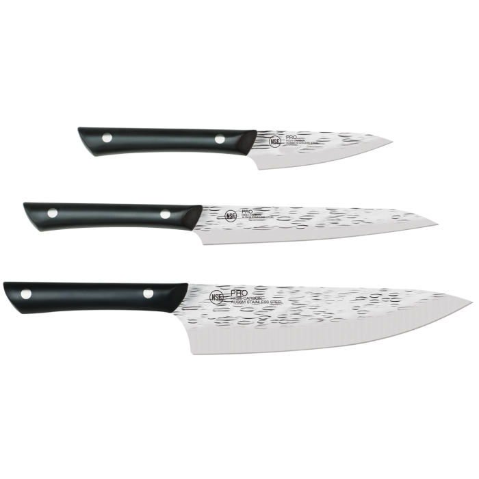Three Kai Pro knives on a white background.