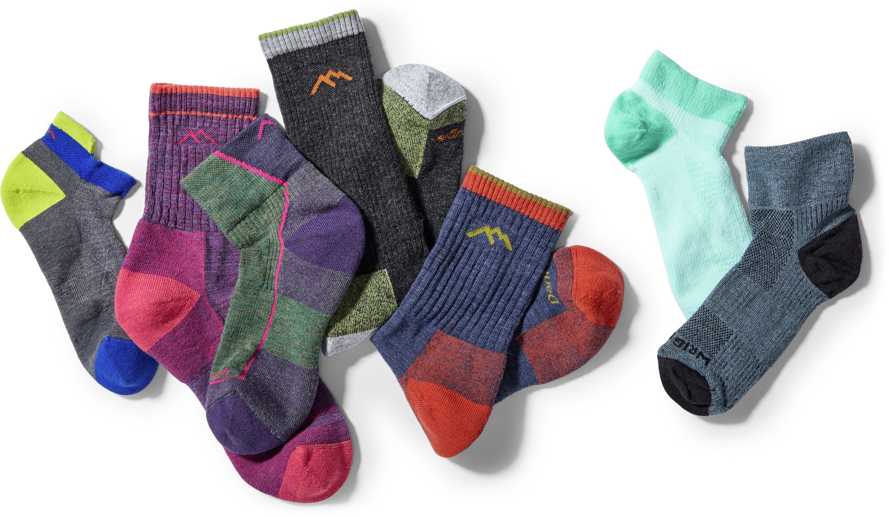 a dozen or so multicolored, thick hiking socks