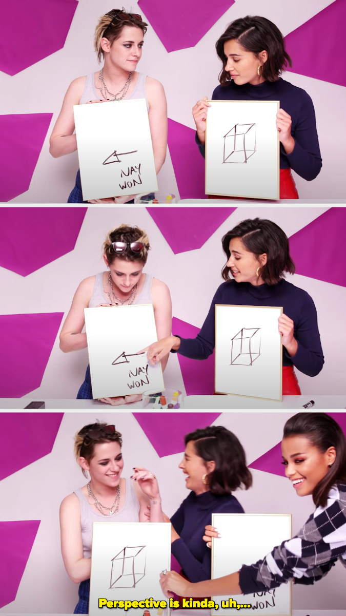 Kristen drawing an arrow pointing to Nay but going the wrong way, realizing, and everyone laughing