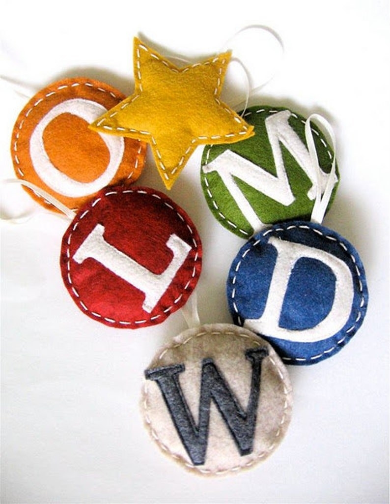 different colored monogrammed ornaments