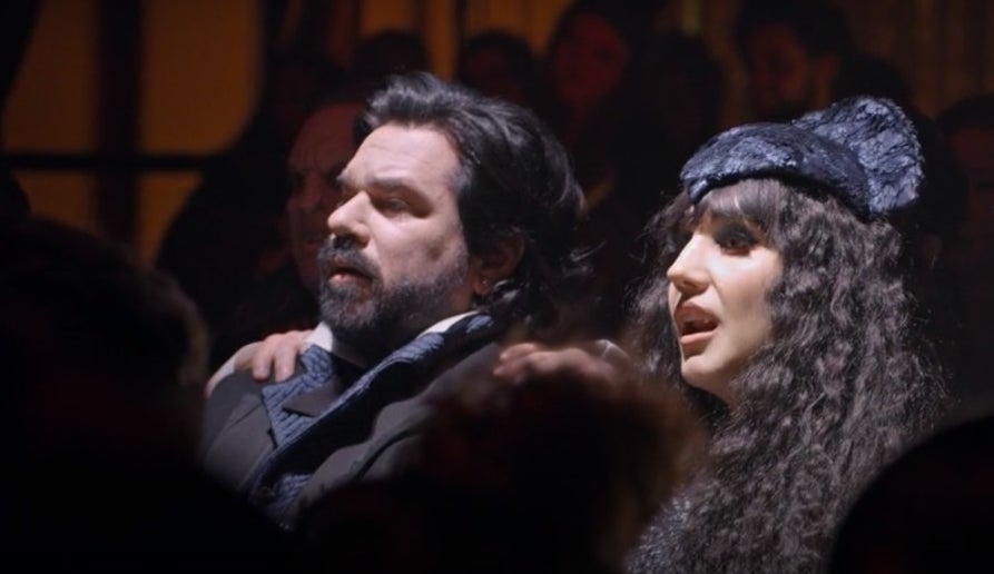 Laszlo and Nadja sitting together at the theatre in &quot;What We Do in the Shadows&quot;