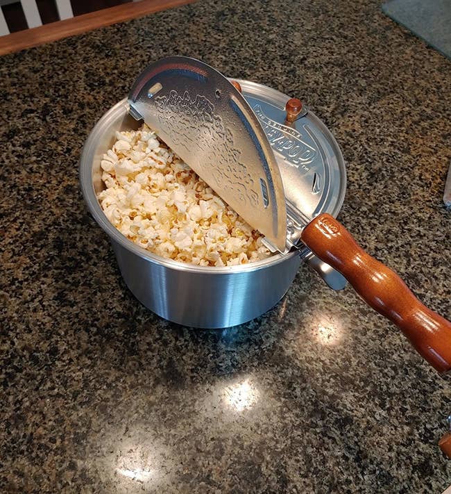 Reviewer's popcorn maker is shown on a kitchen countertop