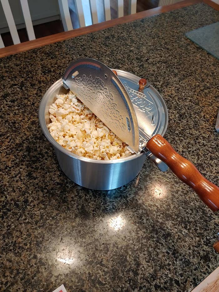 Reviewer&#x27;s popcorn maker is shown on a kitchen countertop