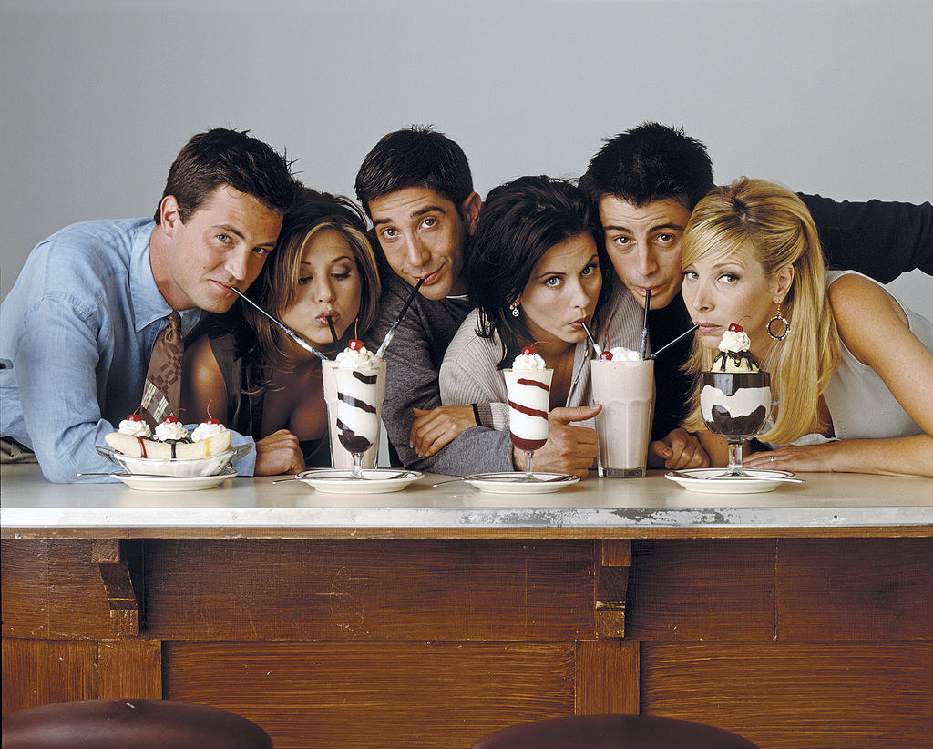 Friends cast drinking milkshakes