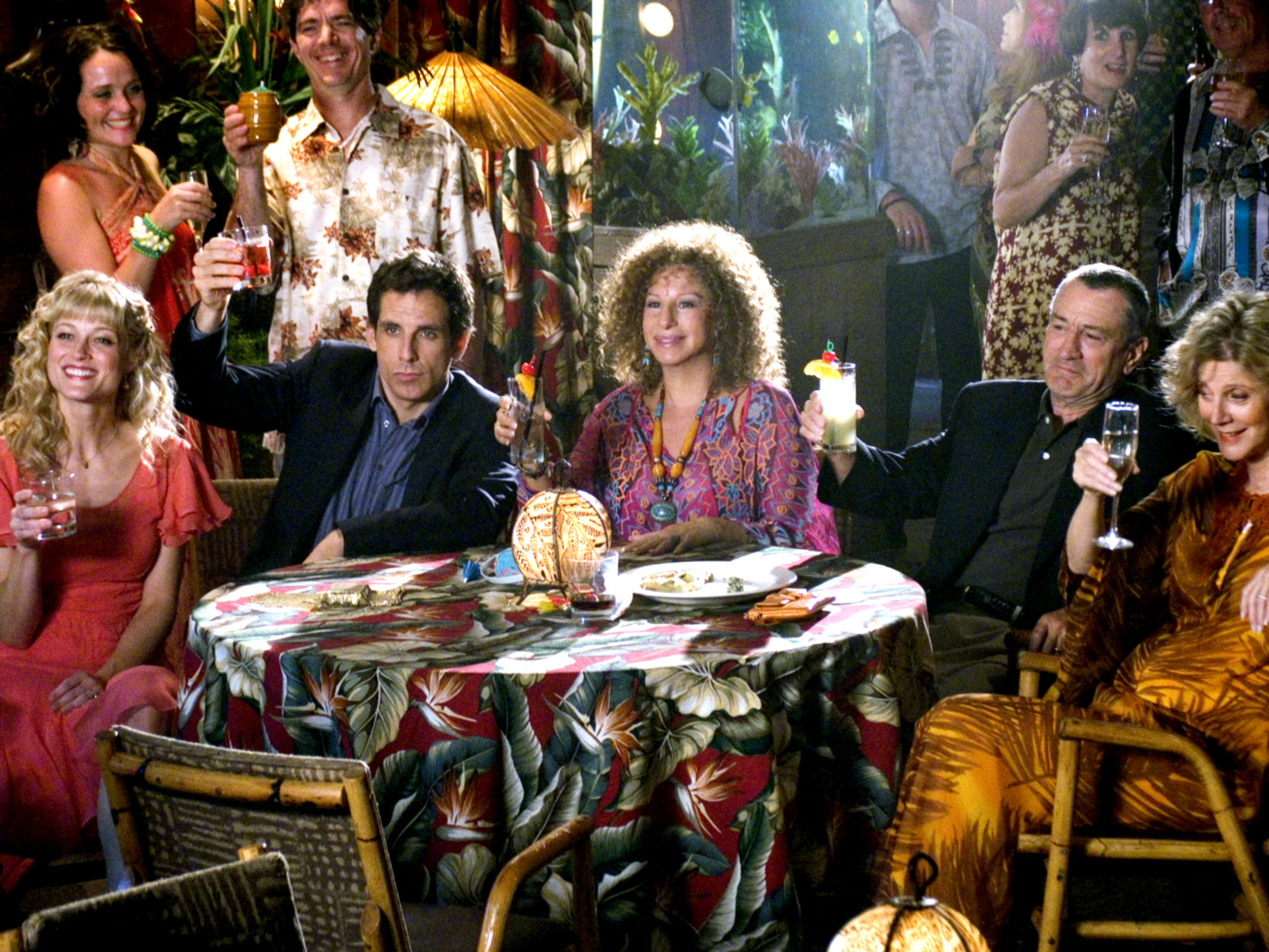 Teri Polo, Ben Stiller, Barbra Streisand, Robert De Niro, Blythe Danner, raising their glass for a toast