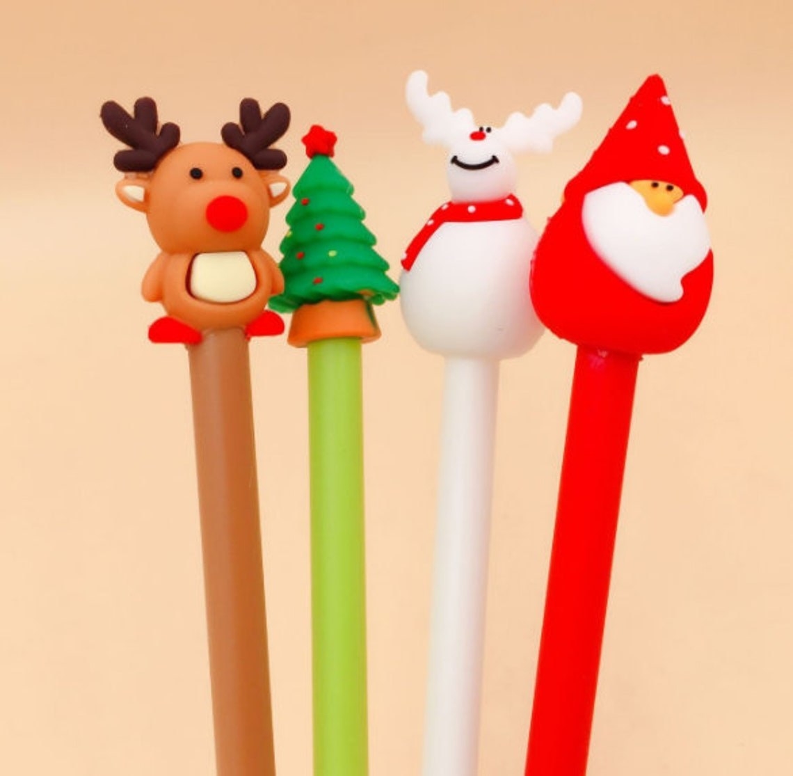 reindeer, christmas tree, and santa pens