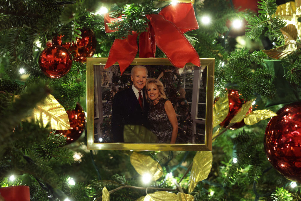 A Christmas ornament featuring a picture of President Biden and the First Lady