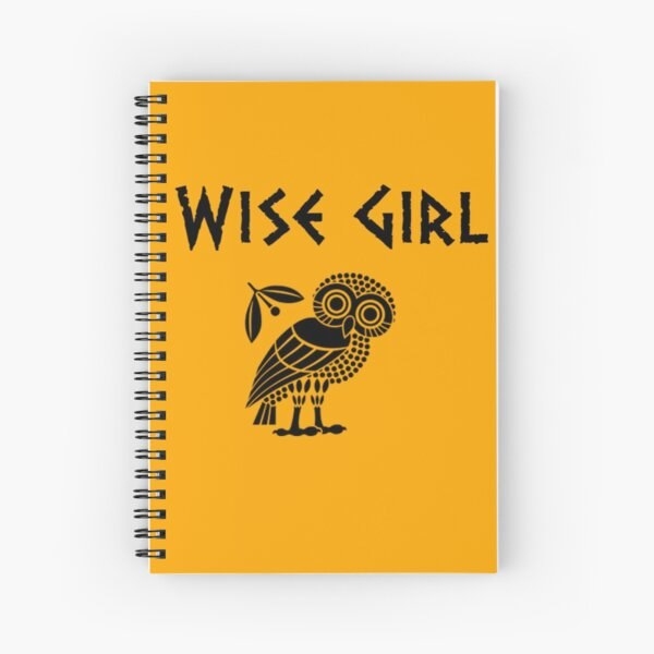 orange and black spiral notebook that reads &quot;wise girl&quot; with an owl symbol