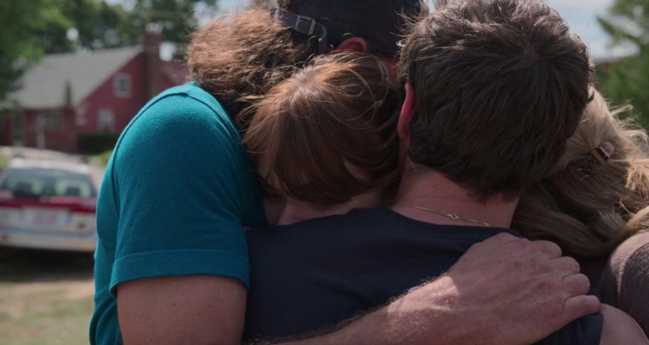 a still from CODA where the family is hugging.