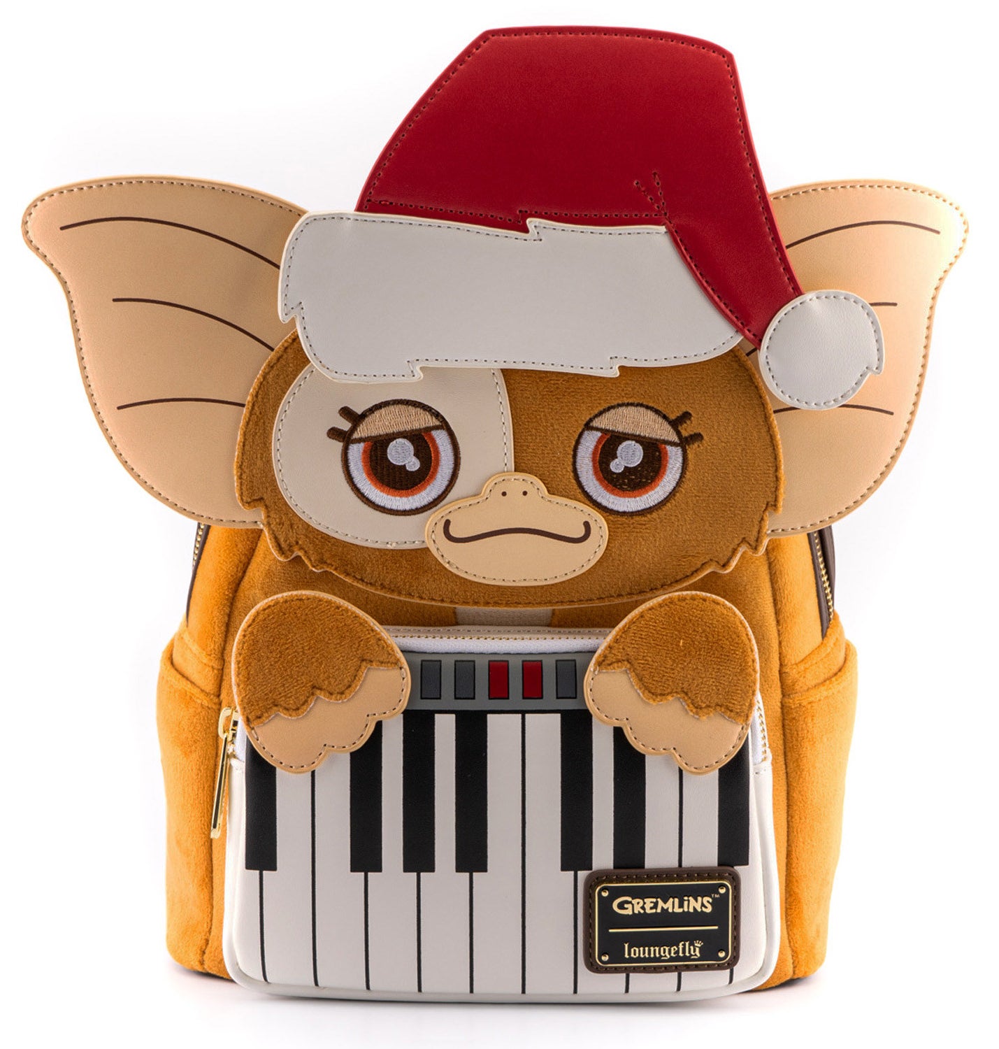 A mini soft backpack with Gizmo&#x27;s face, playing a keyboard and wearing a santa hat