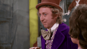 Gene Wilder with his hand on his head