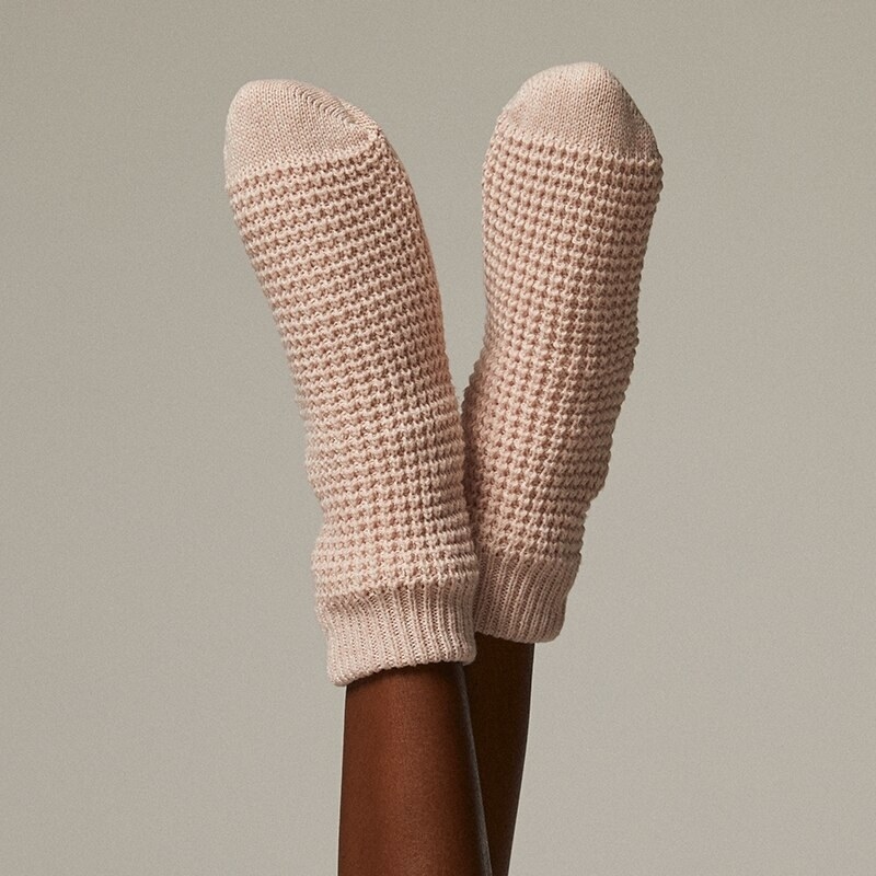 a pair of thick knitted socks