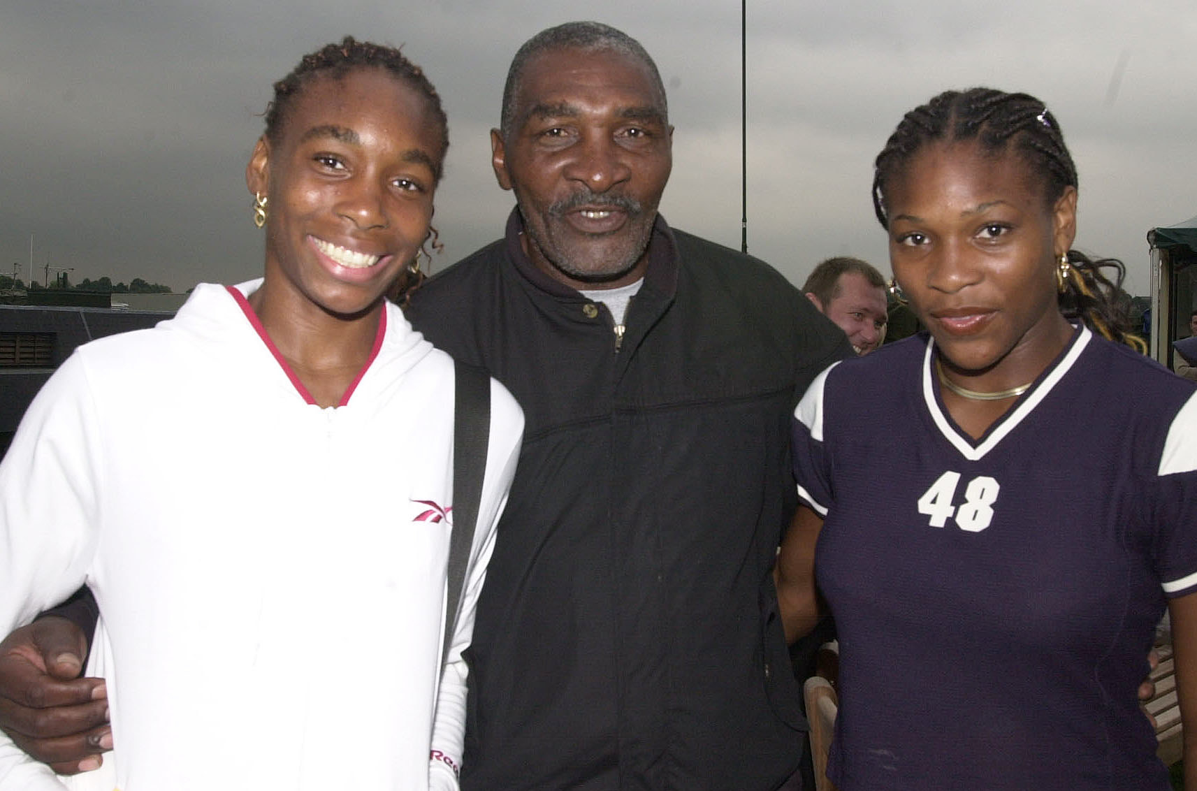 Photo of Venus and Serena Williams with their father Richard