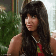 Tahani giving a disapproving look.