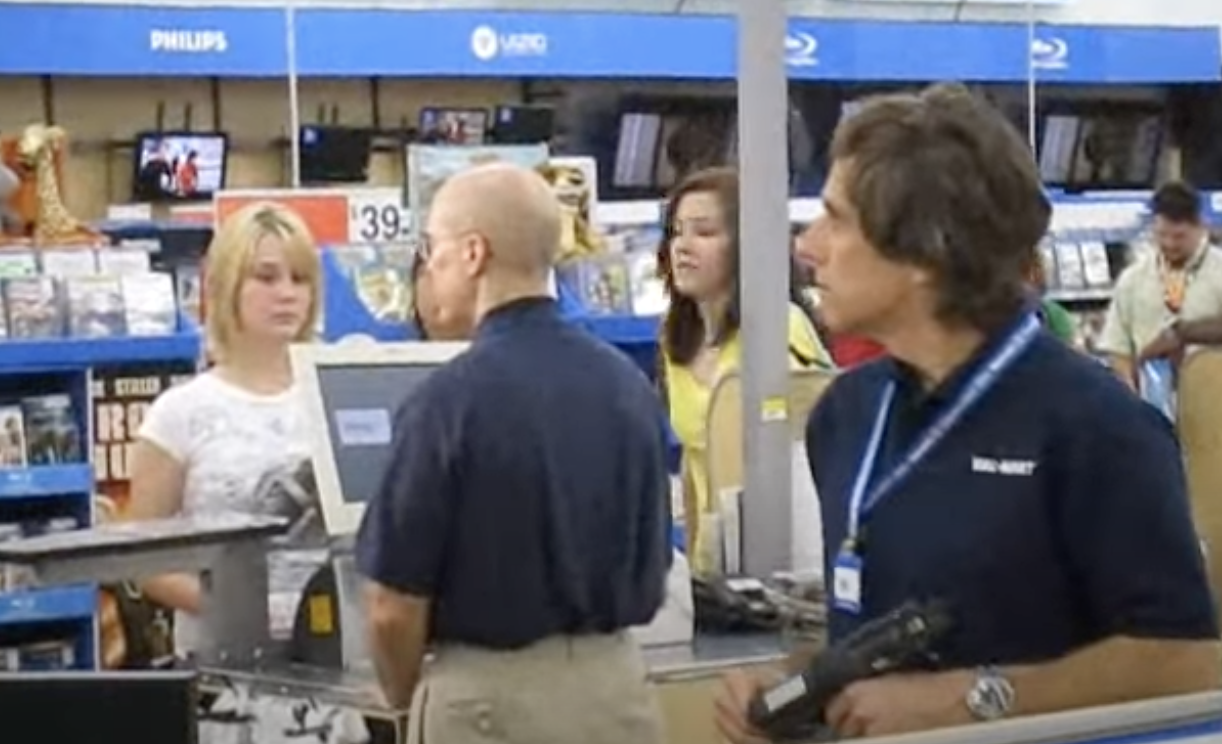 Ben and Jeffrey behind the register at Walmart