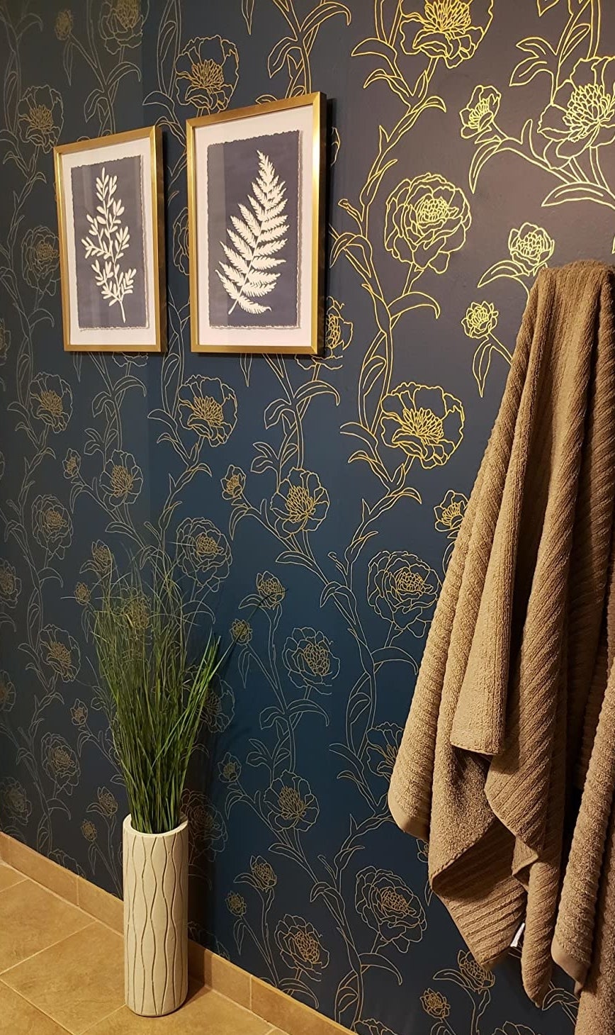 Reviewer image of navy blue and gold metallic floral wallpaper in bathroom