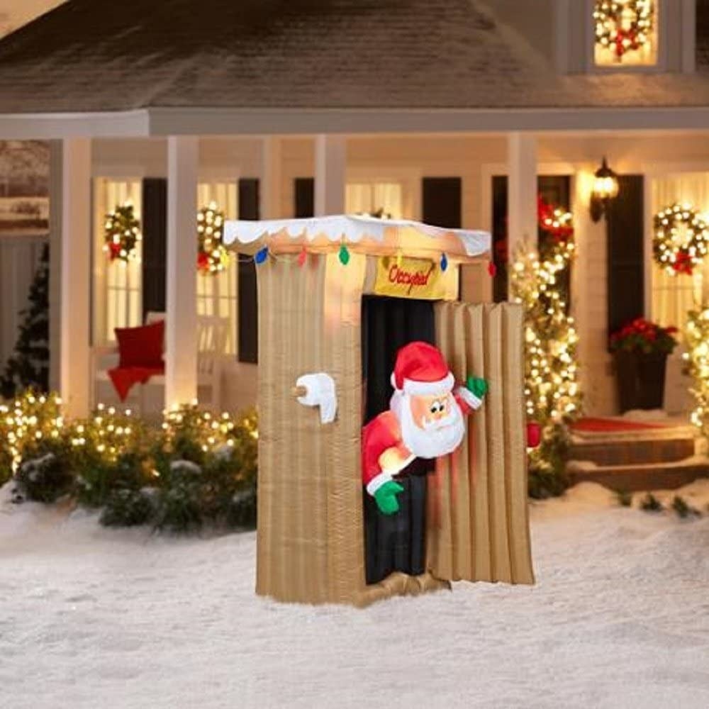 A Santa in a portable outhouse