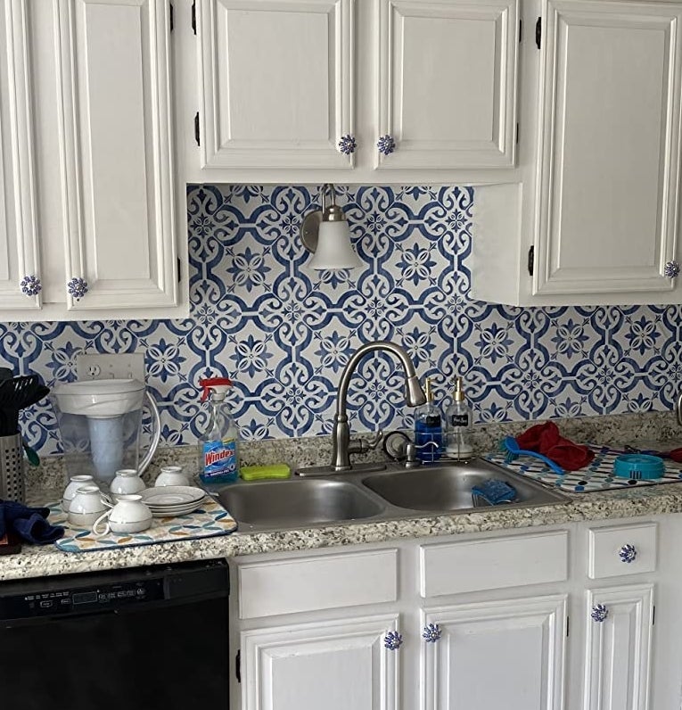 Blue tile wallpaper on backsplash of kitchen