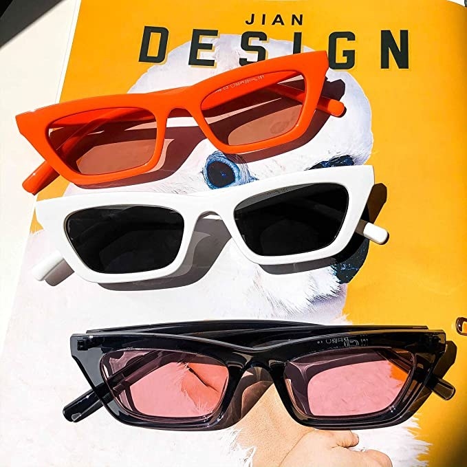 a trio of cat-eye sunglasses on a magazine cover