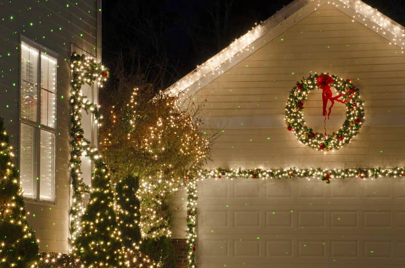 house with garage decorated for christmas
