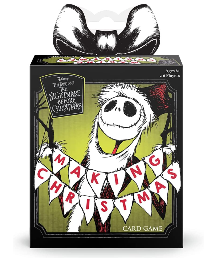 A small card box with Jack Skellington on the front holding a banner that says makign Christmas