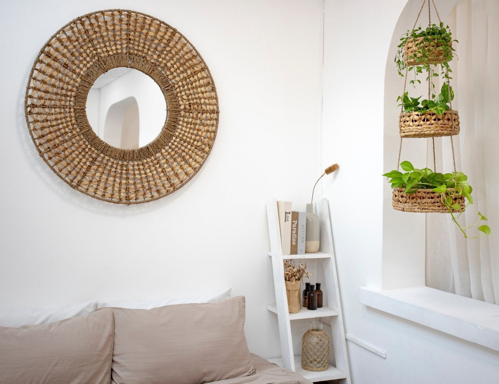 the basket being used as a plant hanger