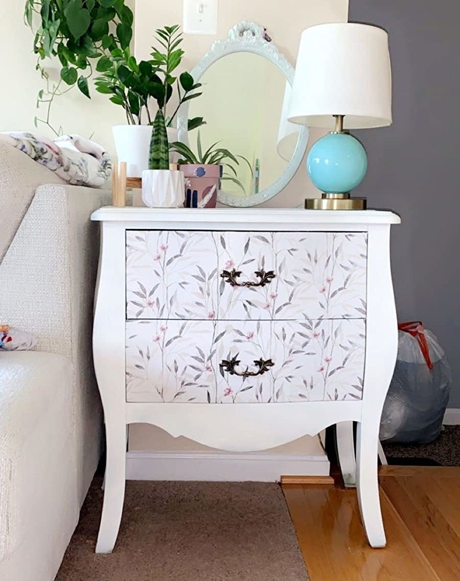 Reviewer image of floral wallpaper on small dresser