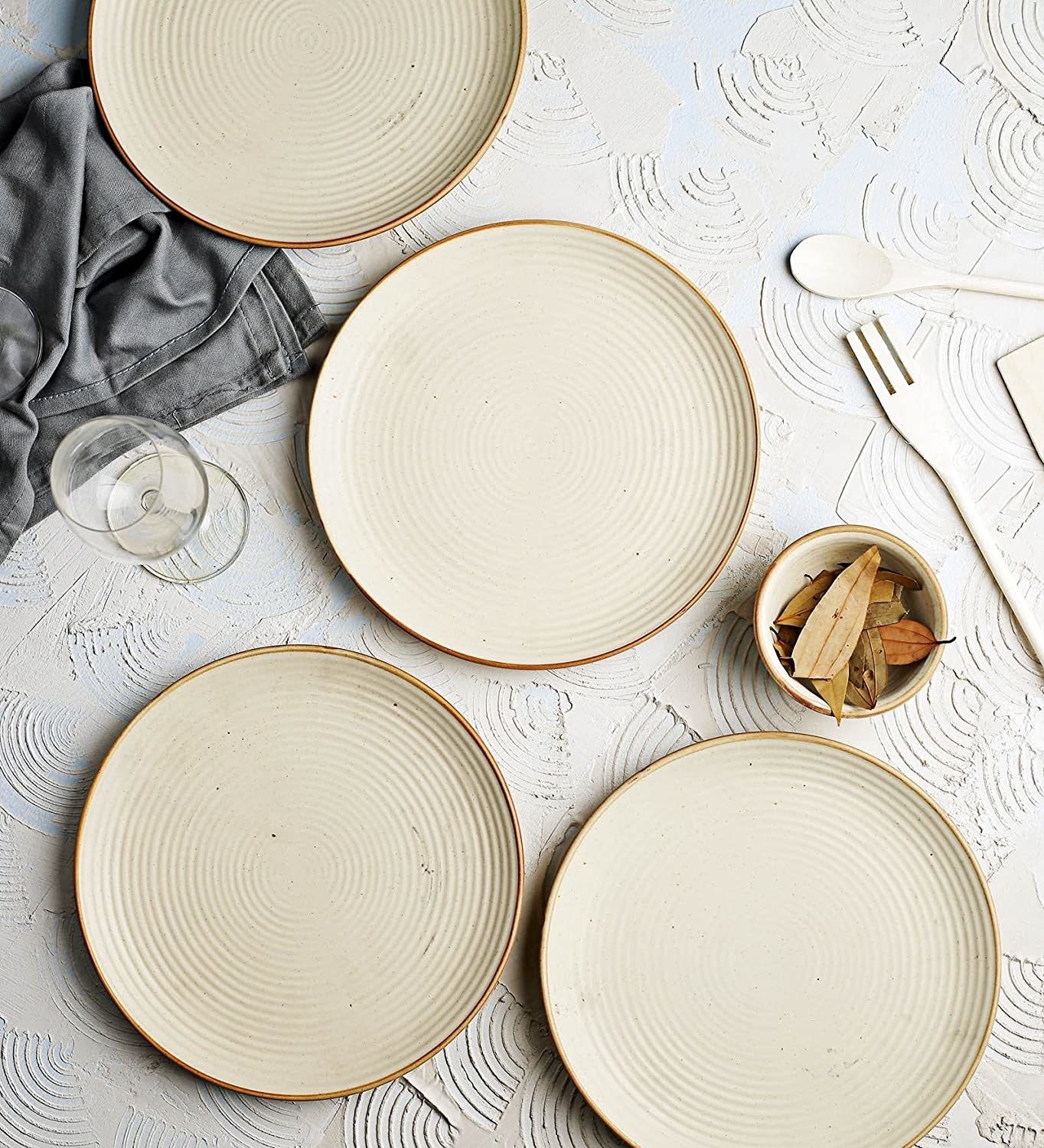 Three dinner plates on a table