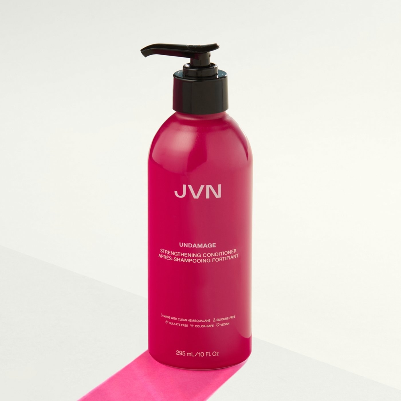 JVN Hair pink bottle of Strengthening Conditioner
