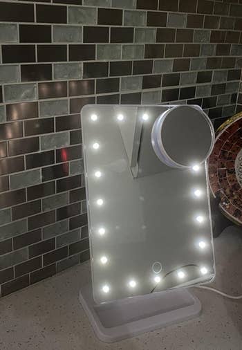 Lighted mirror on counter