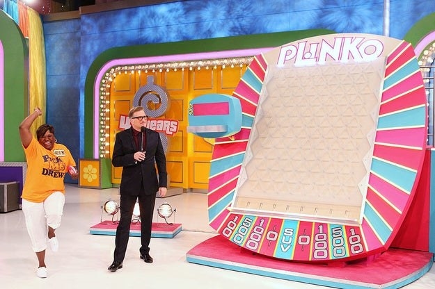 movie fun facts 2021 A woman dances before playing on the plinko board
