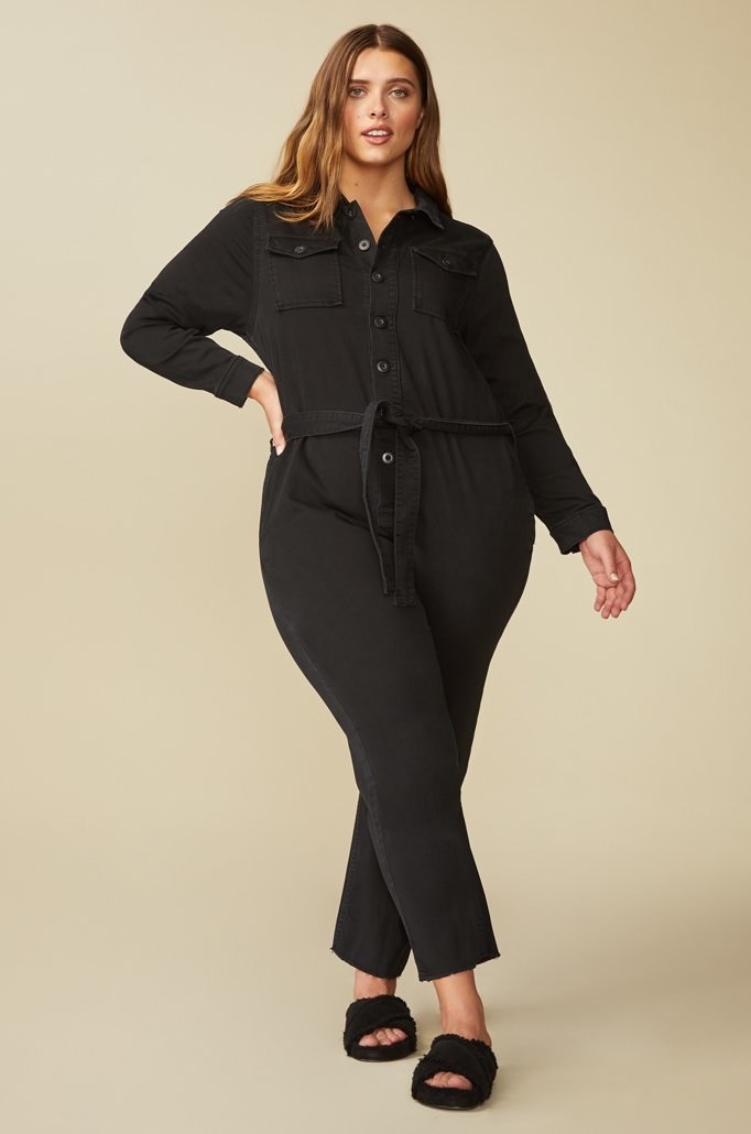 front view of a model wearing the black jumpsuit