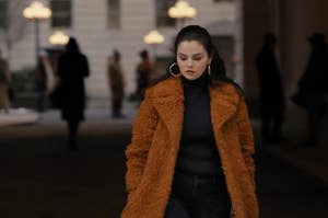 Mabel in orange fuzzy coat