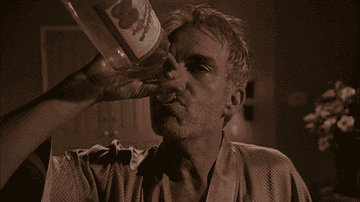 Billy Bob Thorton drinking vodka straight from the bottle.