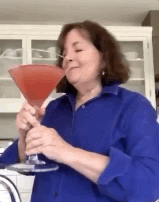 Ina Garten holding a giant cocktail.