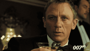 James Bond drinking a Vesper Martini.