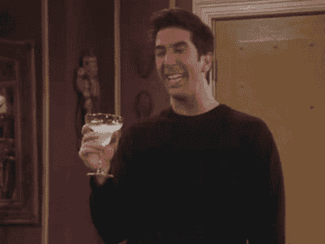 Ross from &quot;Friends&quot; holding a cocktail.