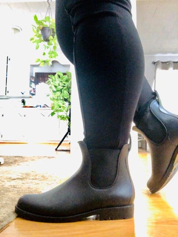 Reviewer photo of them in the rain boots