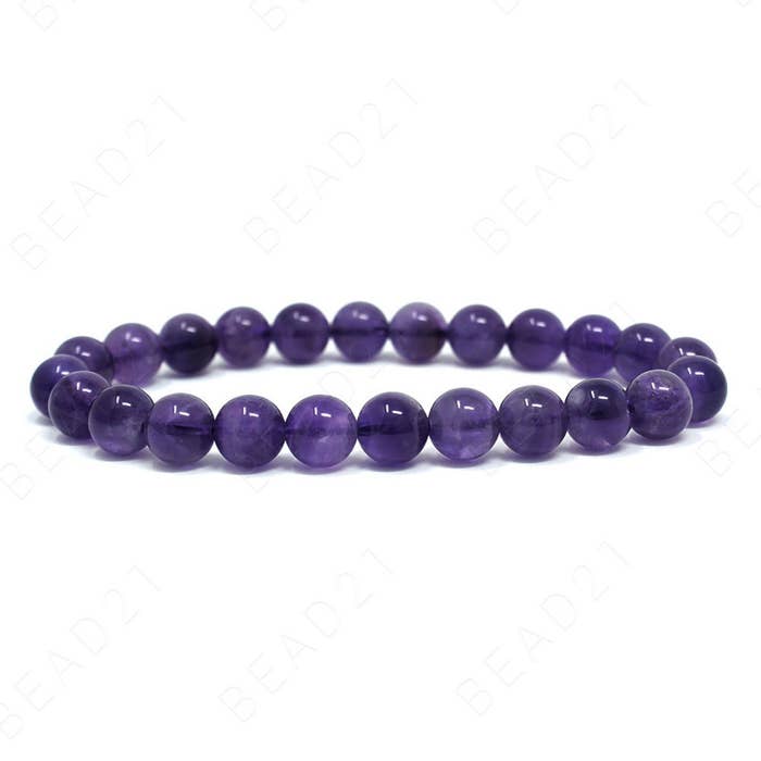 A purple amethyst beaded bracelet.