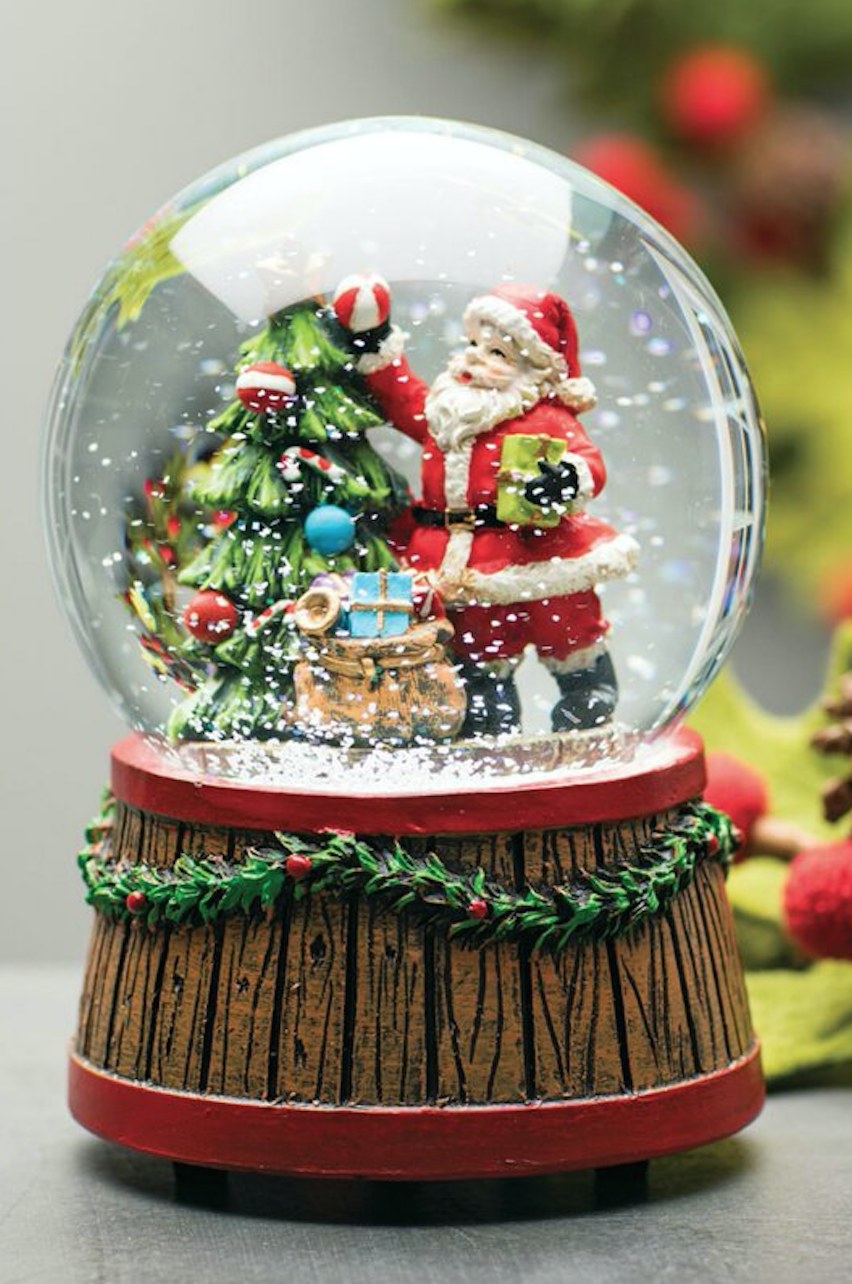Snow globes with santa and christmas tree inside
