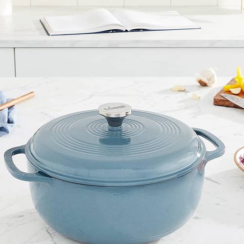 the light blue Dutch oven on a kitchen counter