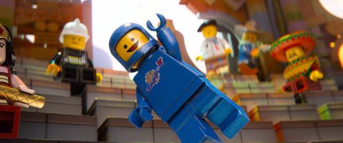 Benny, the space man lego, jumping up, happy
