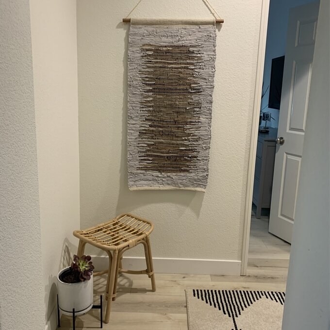 A reviewer&#x27;s image of a hanging tapestry