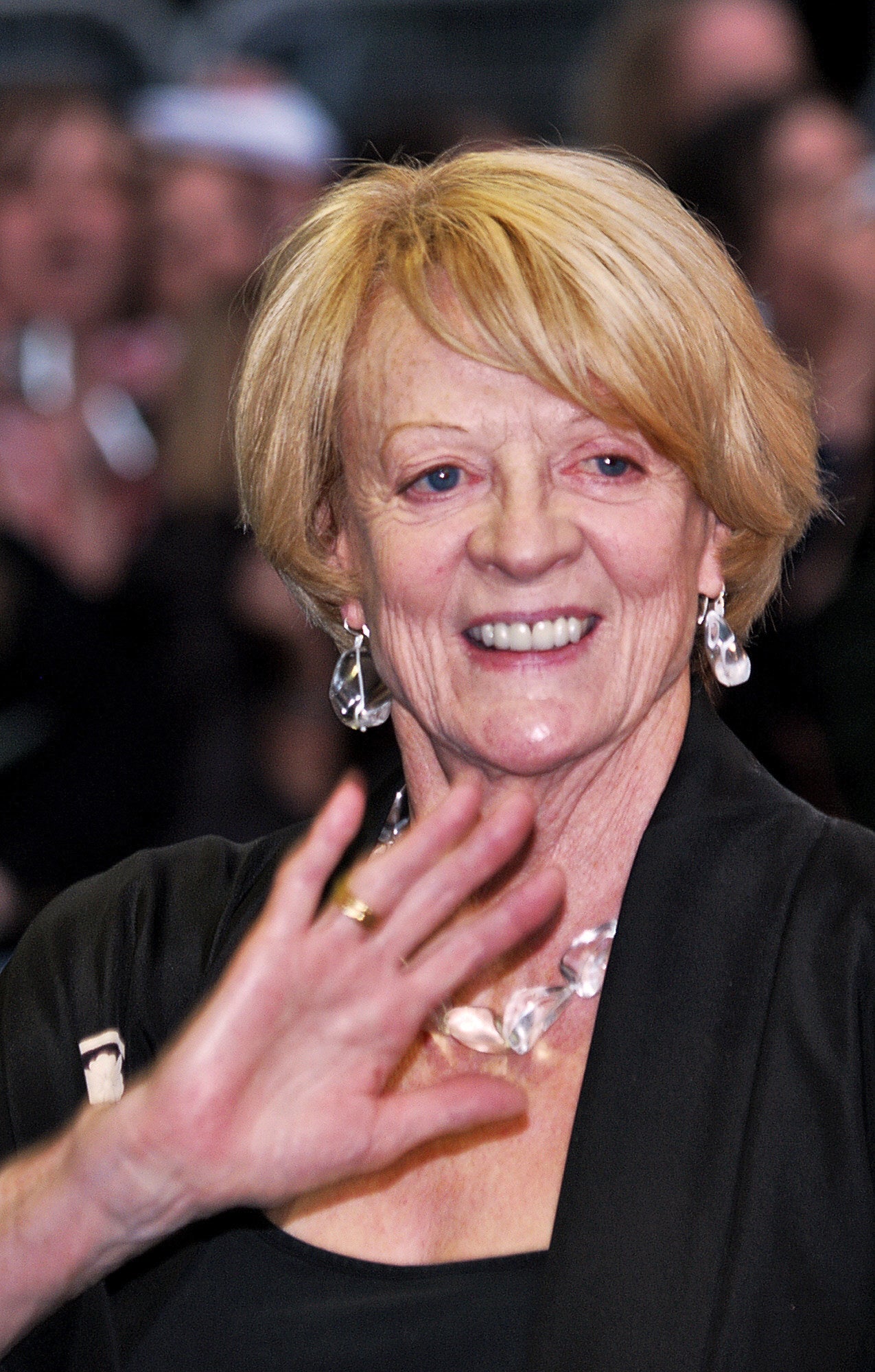 Maggie Smith waving to the crowd