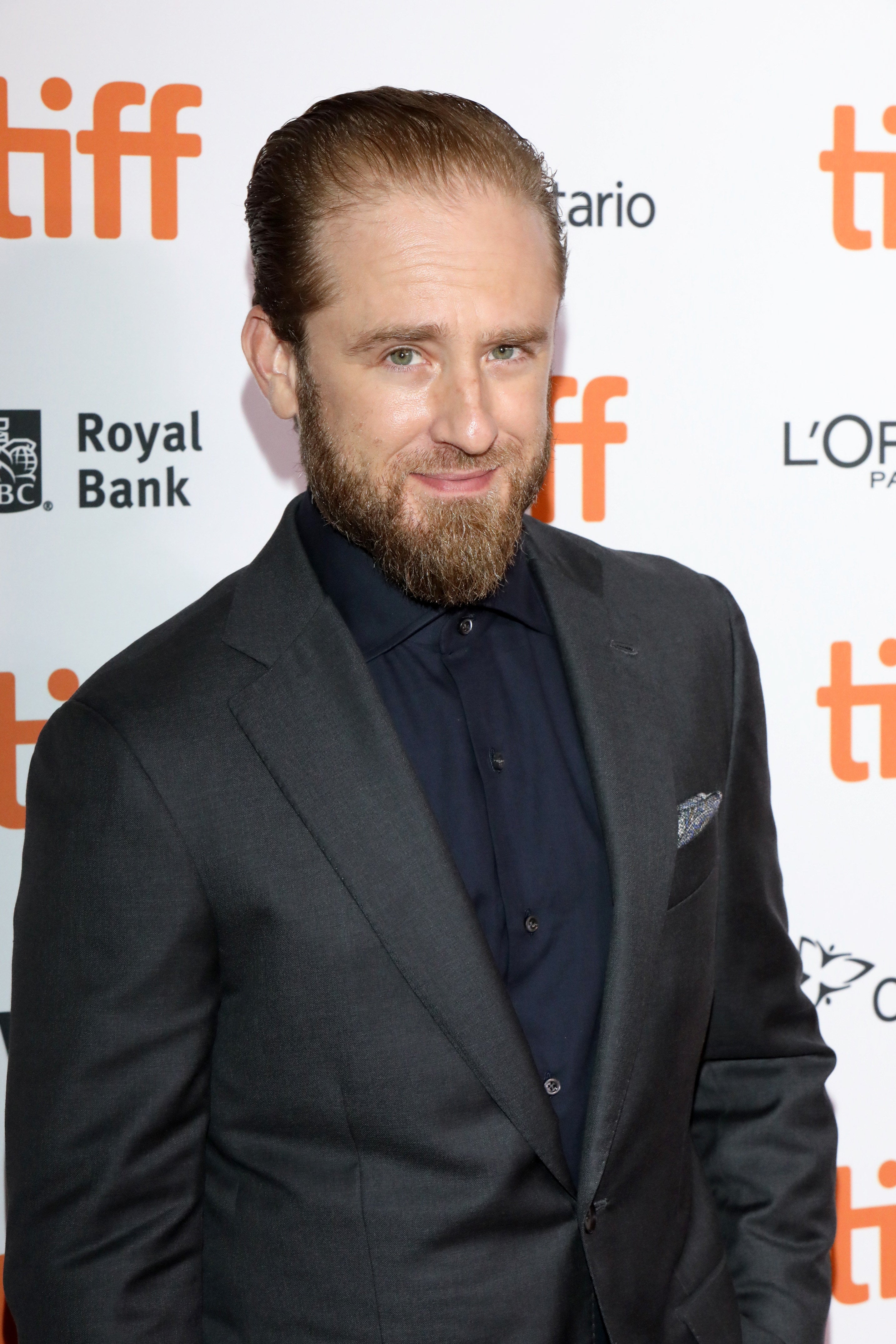 Ben Foster looking into the camera and smiling