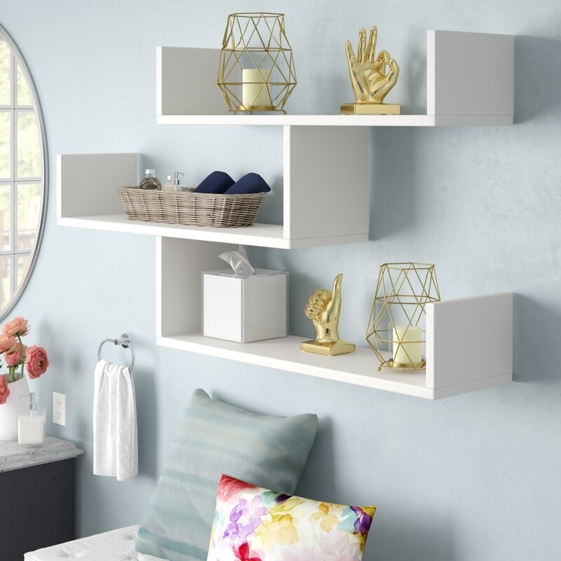 An image of a three-piece accent shelf on a wall