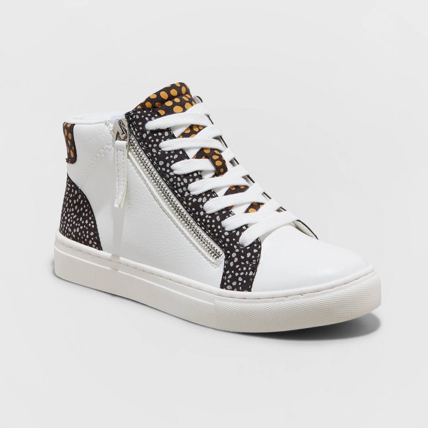 white hightop sneaker with zipper and accent patterns