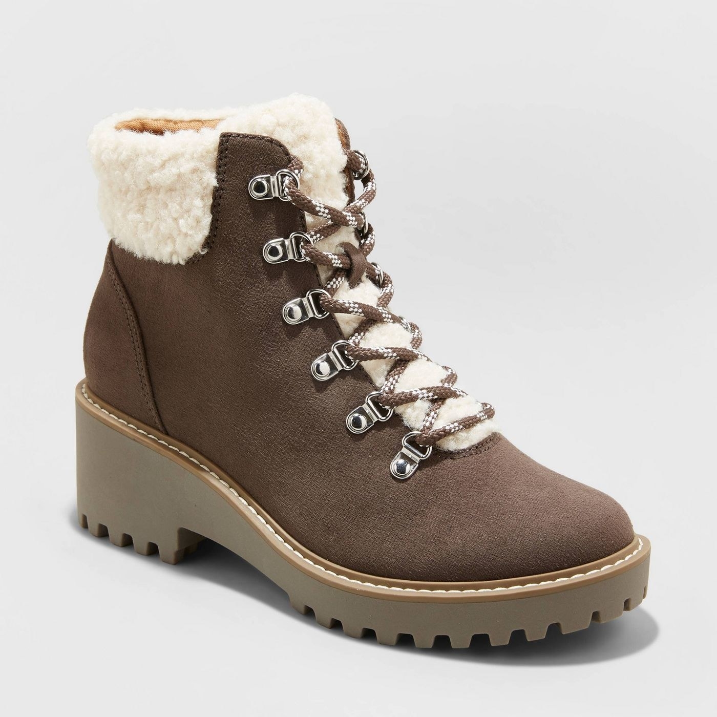 brown hiking boot with block heel and sherpa lining