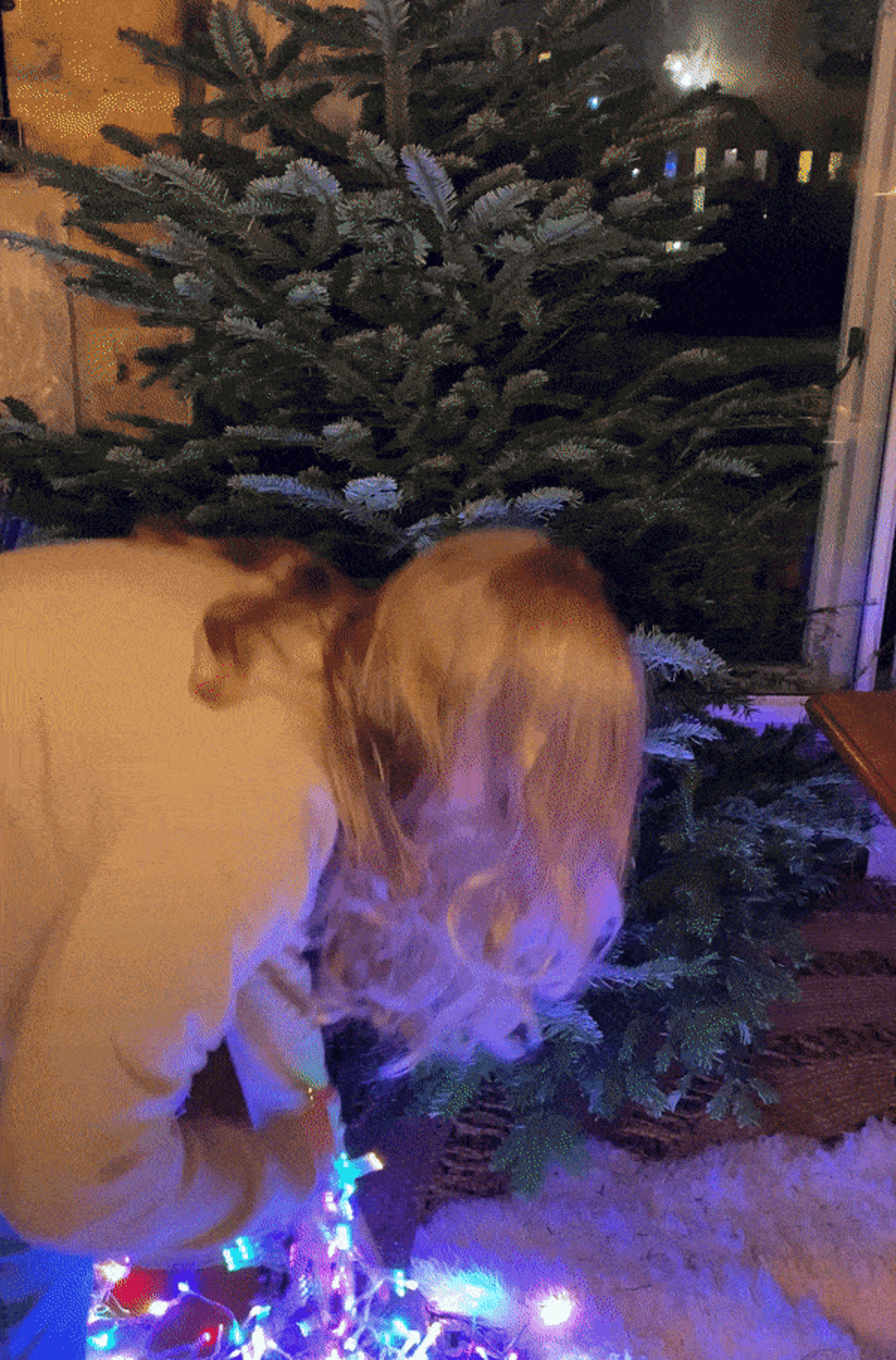 emma untangingling all the christmas lights