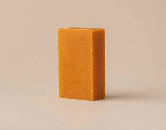 an orange shampoo bar